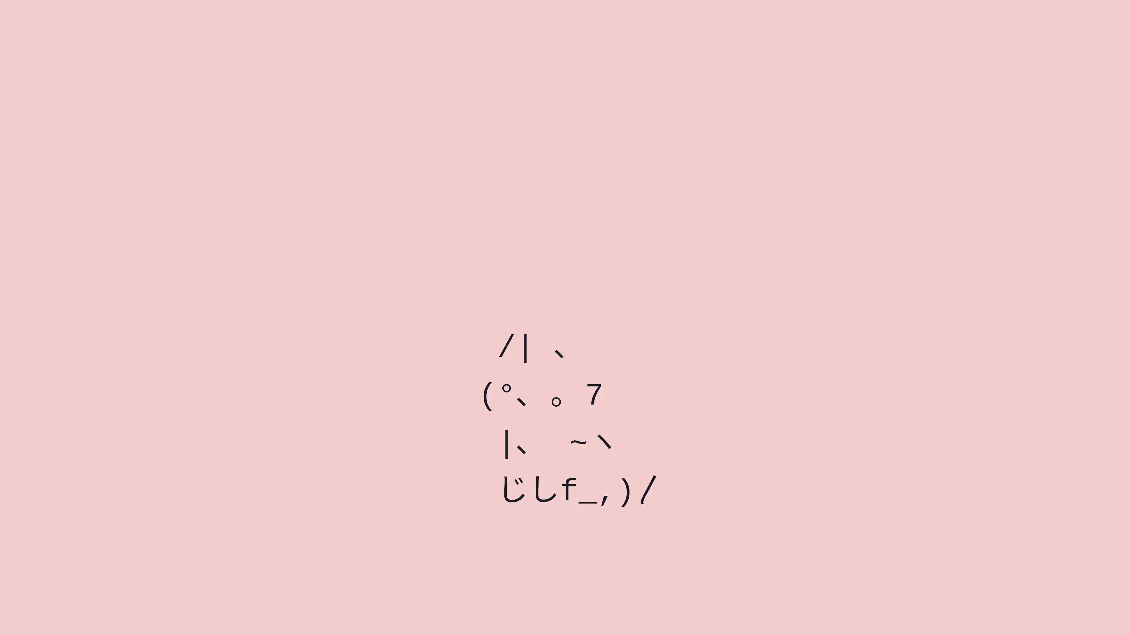 kaomoji_character_on_pink_background.jpg