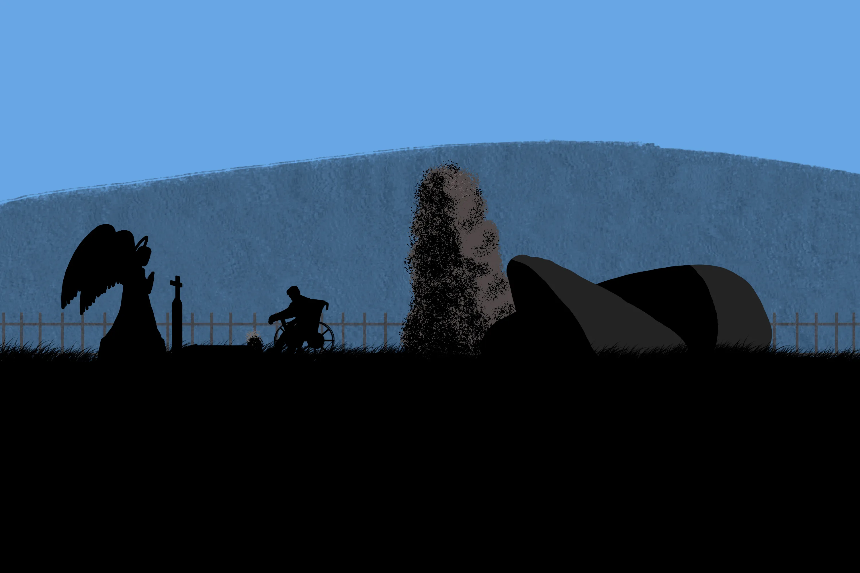 person_in_wheelchair_at_cemetery.jpg