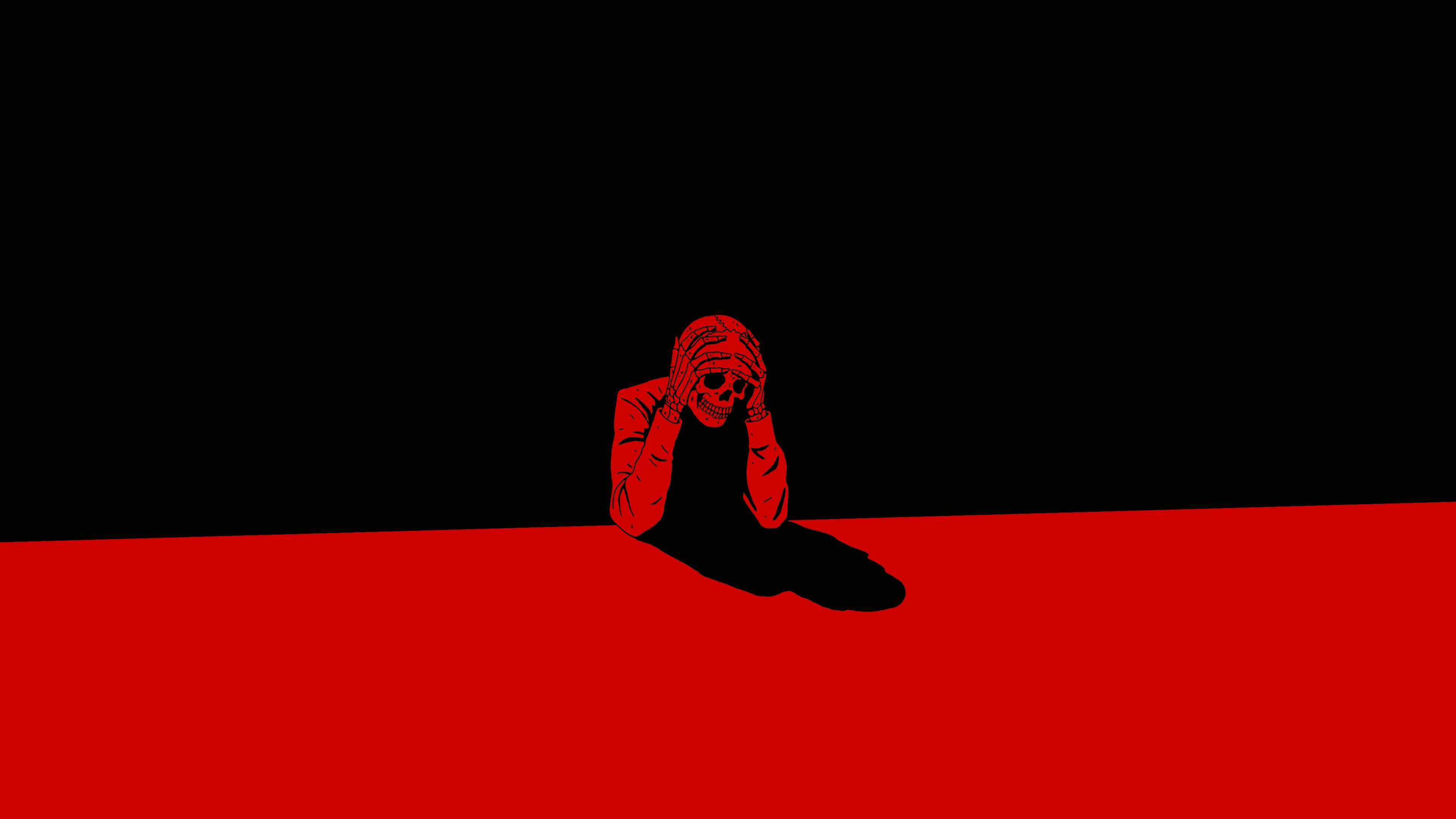 skull_figure_sitting_in_red.jpg